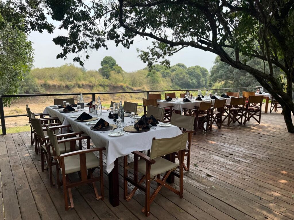 Full table dining setup at the tect at Enkakenya Mara Camp